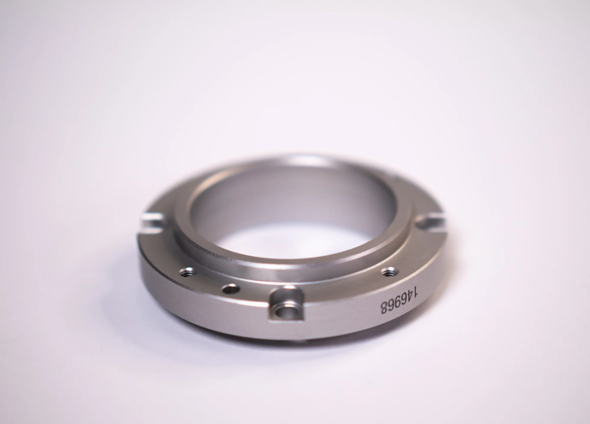 Ring-shaped flange with holes around its circumference